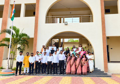 Faculty and staff of Abhinav Mahavidyalaya in front of the college building